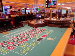 Wild Bandito slot game interface on danatoti mobile showing reels and paytable